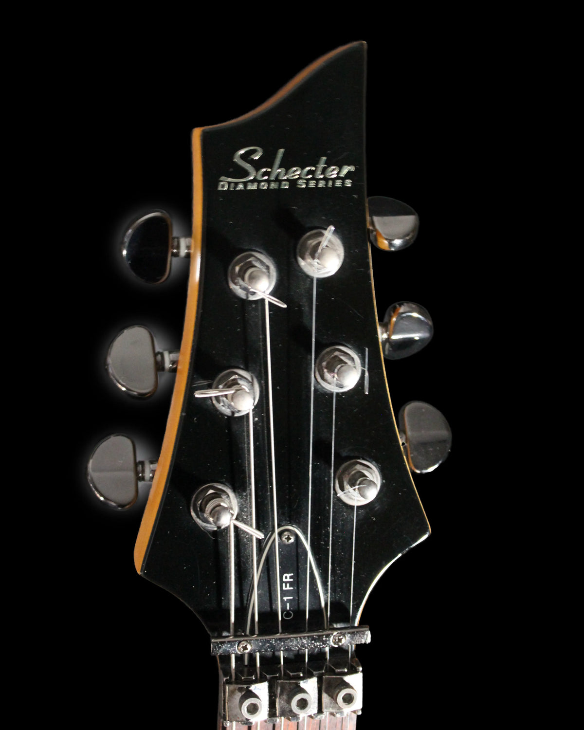 Schecter C1 FR electric guitar with a sleek black body, rosewood fretboard, and double-cutaway design from CDS Guitars.