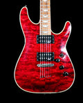 CDS Guitars Schecter Omen Extreme electric guitar with sleek black body and modern design, shown from a side view.