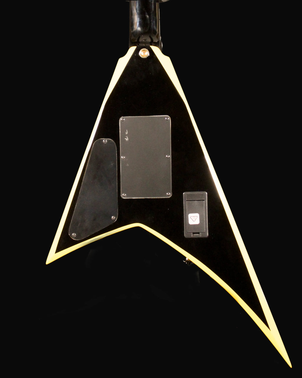 CDS Guitars Jackson RRX24 Rhoads electric guitar with black finish and sharp body shape, shown on a stand.