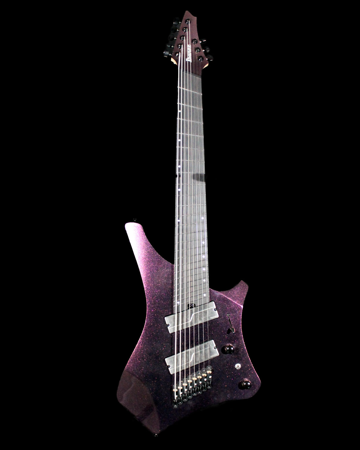 Ibanez Alpha A528-CMG 8-string electric guitar with a sleek black finish and modern design, photographed from a front angle.