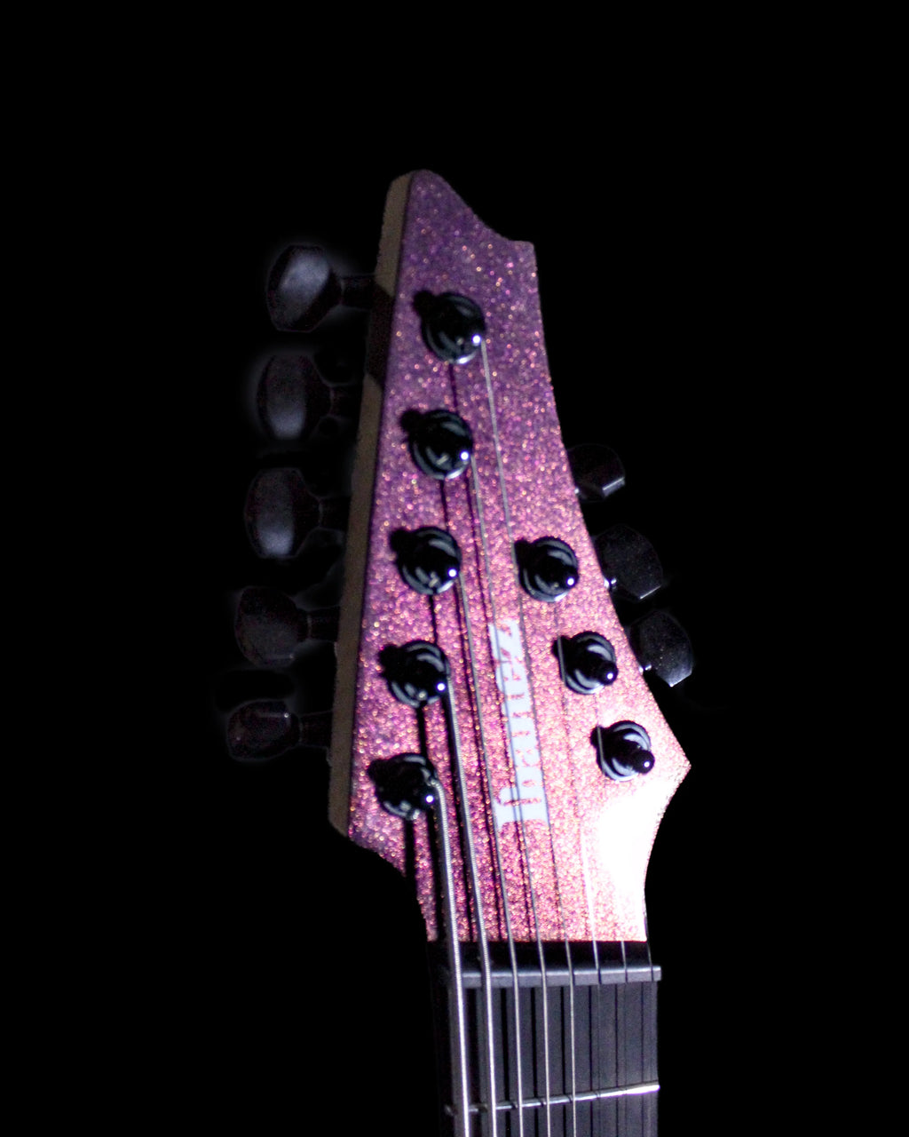 Ibanez Alpha A528-CMG 8-string electric guitar by CDS Guitars, black finish, body and neck details visible.