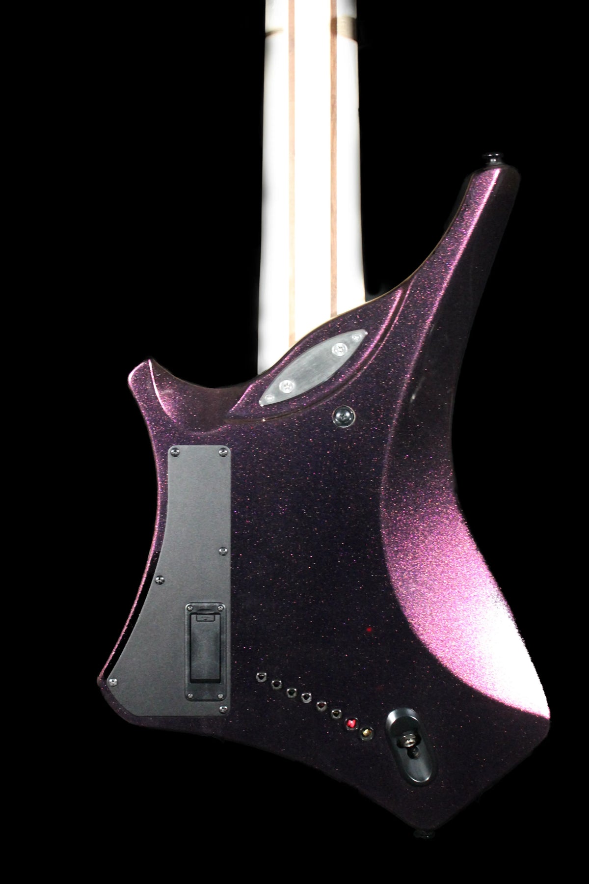 Ibanez Alpha A528-CMG 8-string electric guitar by CDS Guitars, showing the sleek black finish and detailed body design.