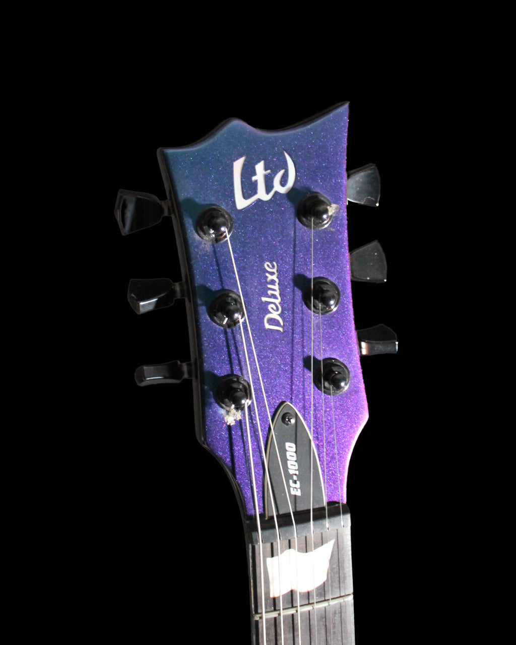 CDS Guitars ESP LTD EC-1000 electric guitar with sleek black finish and double-cutaway body, shown resting on a stand.